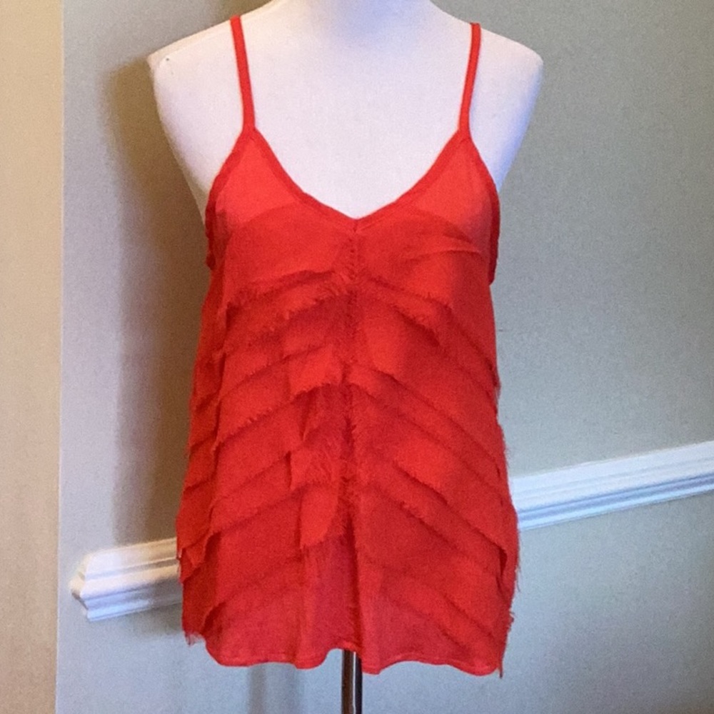 Logix size large red tank top with spaghetti straps & decorated w/strips of ray